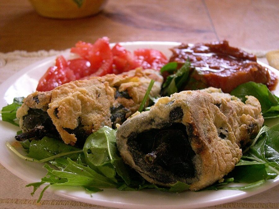 Chiles rellenos in tomato broth